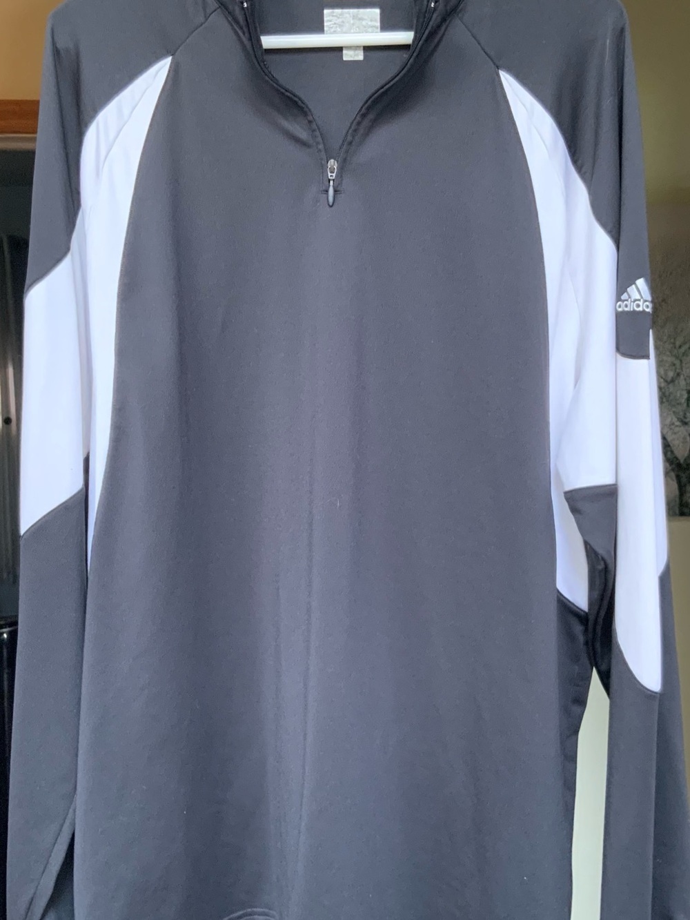 Men’s Adidas quarter-zip pullover.